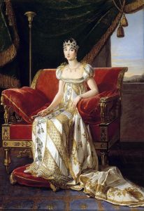 Peinture de Marie-Guillemine Benoist, représentant Pauline Bonaparte en robe empire blanche et or assise sur un fauteuil de velours rouge, couronne sur la tête
